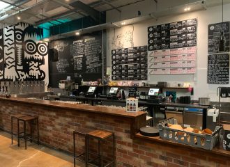 The brick-built bar gives the taproom an industrial feel and the back bar reflects the distinctive Magic Rock branding